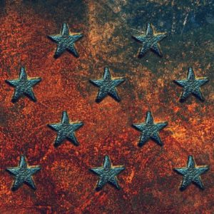 embossed-usa-star-shapes-on-rusty-metal-surface-PGUB6T5